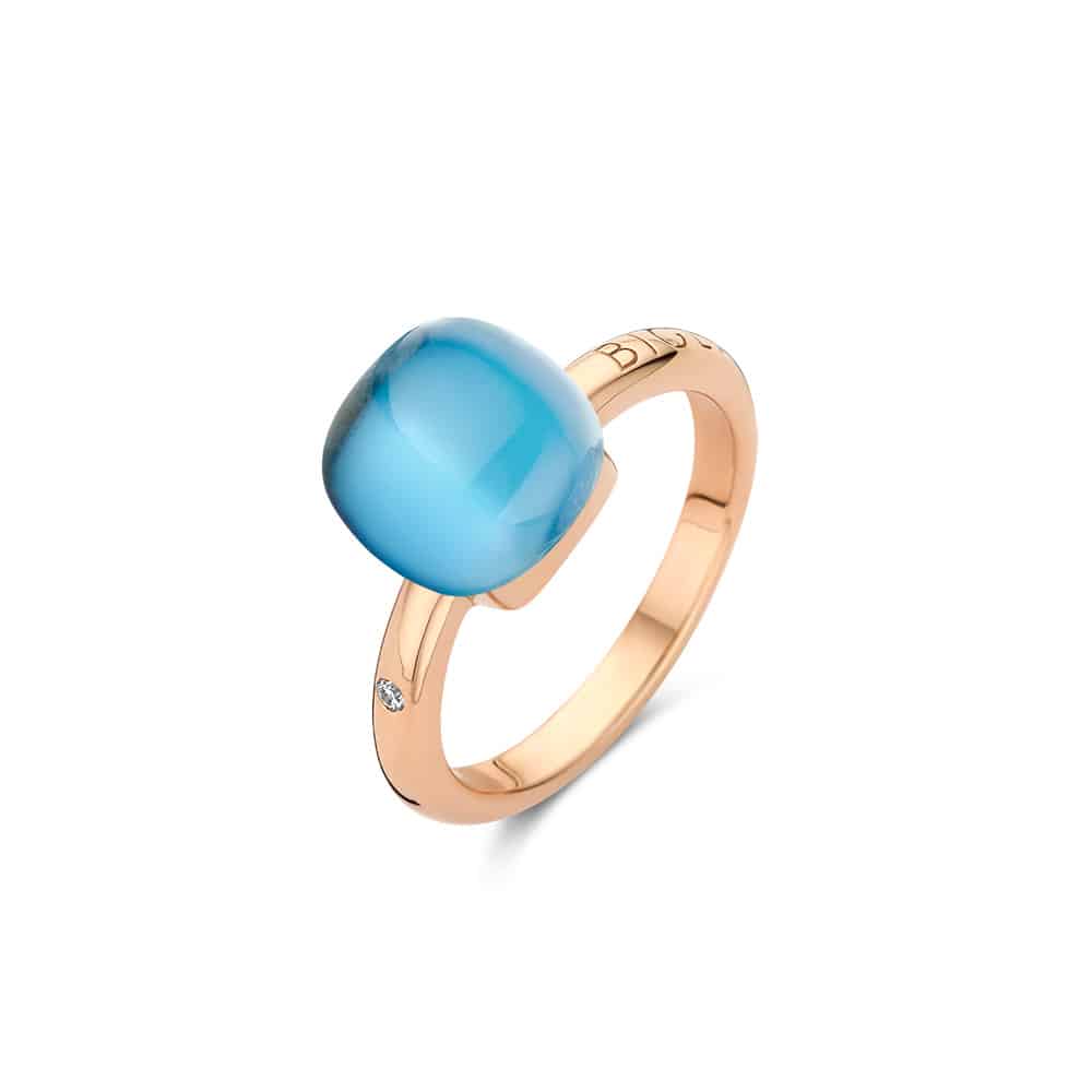 18kt rose golden Mini Sweety ring with blue topaz and mother of pearl, finished with our 0.02ct signature diamond