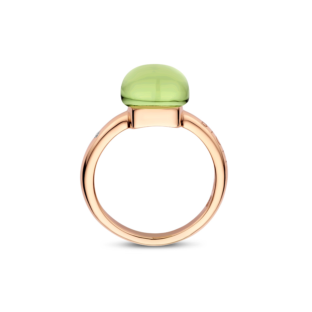 18kt golden ring with peridot and our signature diamond